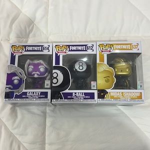 Galaxy, 8-ball, and Midas Funko pops